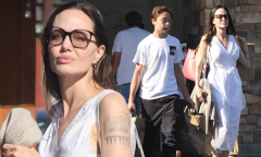 Angelina Jolie looks chic in a white maxi dress as she goes ...