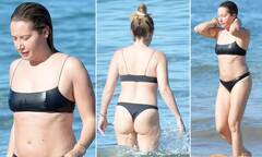 Ashley Tisdale sizzles in cheeky bikini as she splashes in the ...