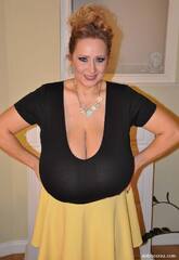 Abbi Secraa Big Cleavage in Yellow Skirt - The Boobs Blog 