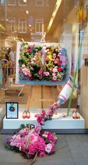 Flowers in a glass display case