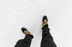 Man in Winter Shoes on Snow Covered Road FPV Stock Photo ...