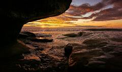 Silhouette of Rock Formation on Sea during Sunset · Stock Photo