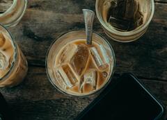 Ice Coffee with Drinking Straw Beside a Potted Plant · Stock ...