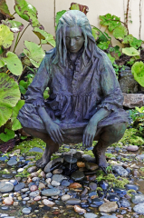 Crouching Woman (John Seward Johnson Statue Squatting Woman)