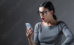 Young woman staring at her phone - stock photo 852091 | Crushpixel