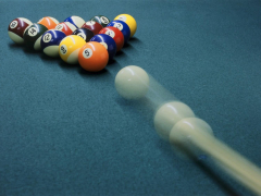 Cue Ball Rolling Towards Racked Billiard Balls