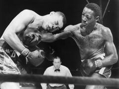 Joe Louis (Left), and Ezzard Charles, in a Heavyweight Title Bout, Sept. 27, 1950