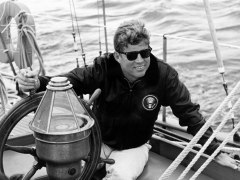 Vintage Photo of President John F. Kennedy Sailing Aboard His Yacht